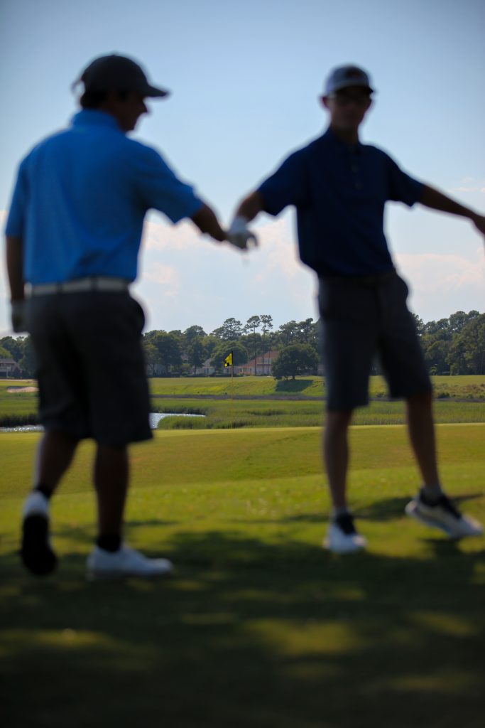 sean and cory playing a round together