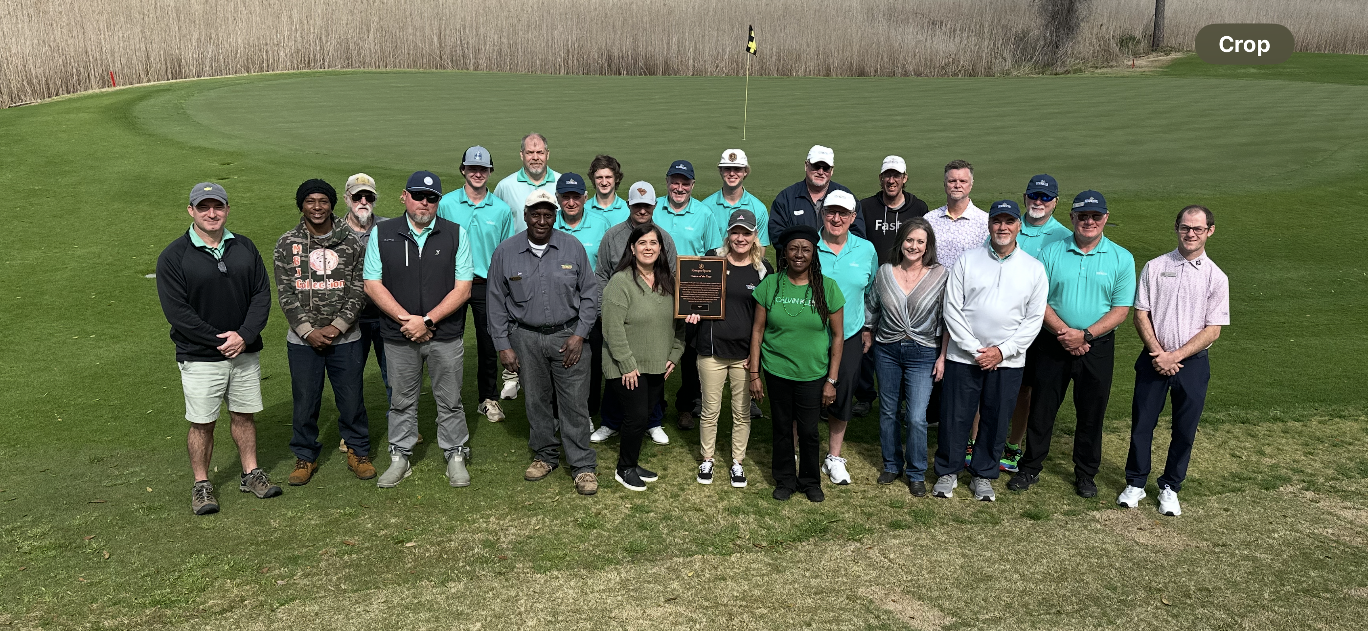 Team Tidewater photo holding the 2024 KemperSports course of the year award